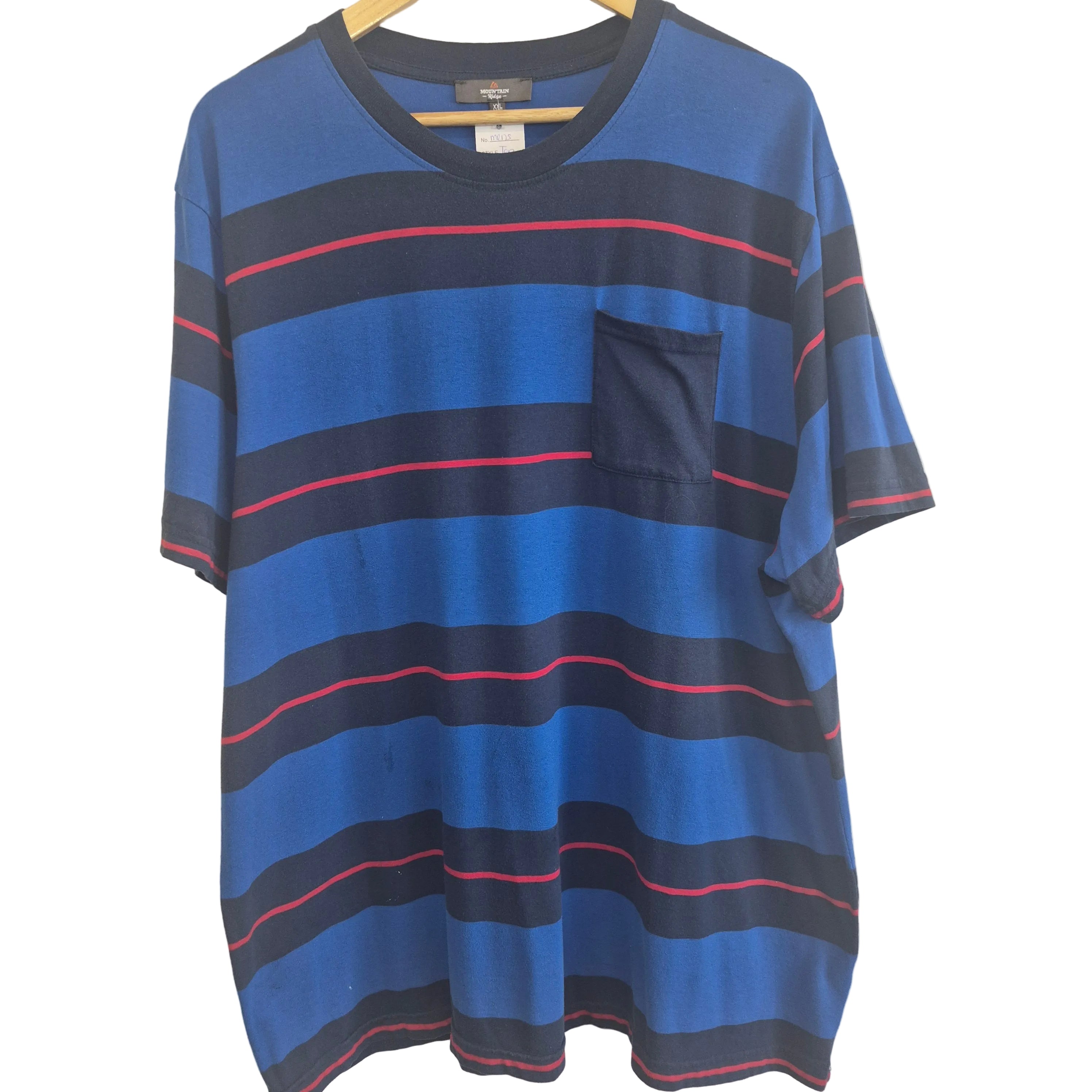 Blue and black striped shirt with red accents on a beige background